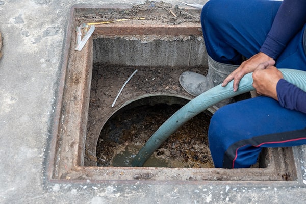 grease trap pumping is essential for removing built-up grease and solids from the trap to prevent clogs and sewage backups